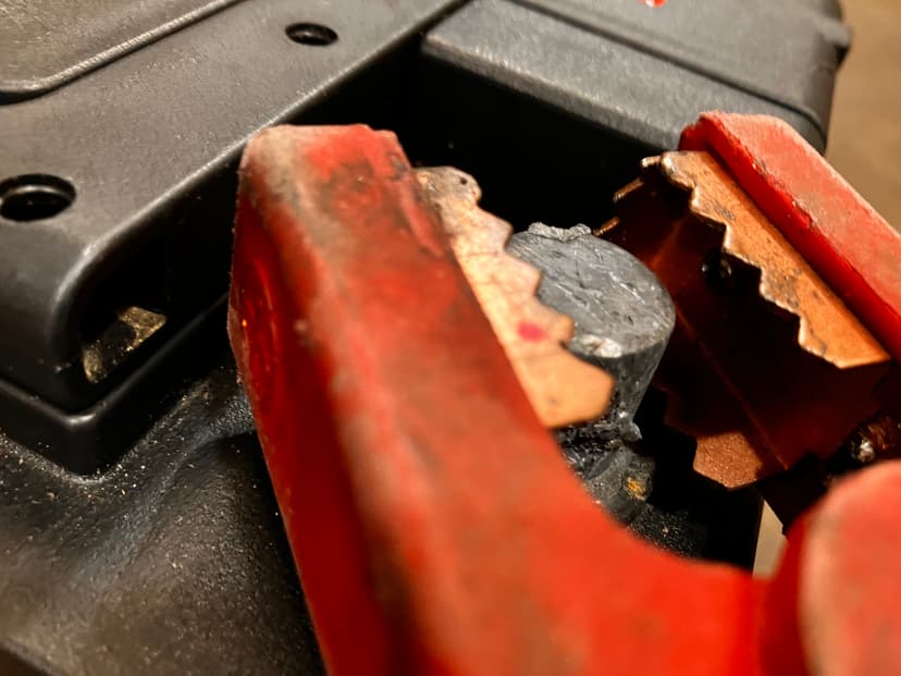 man jump starting car